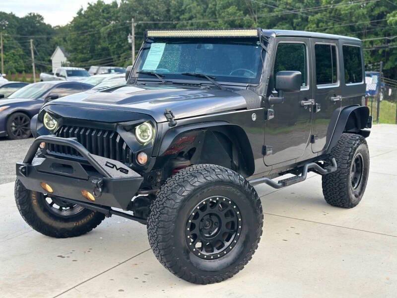used 2016 Jeep Wrangler Unlimited car, priced at $18,999