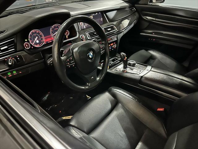 used 2015 BMW 750 car, priced at $15,495