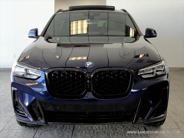 used 2022 BMW X4 car, priced at $37,998