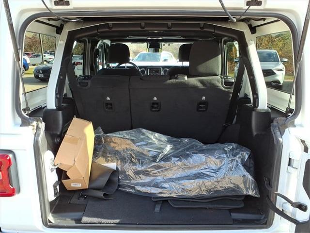 used 2021 Jeep Wrangler Unlimited car, priced at $26,128