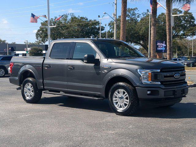 used 2018 Ford F-150 car, priced at $25,988