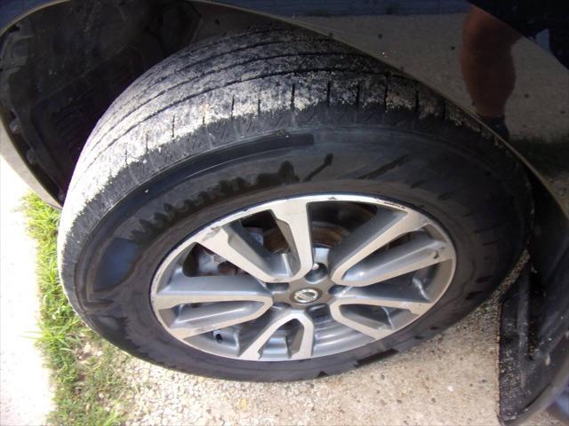 used 2013 Nissan Pathfinder car, priced at $8,000