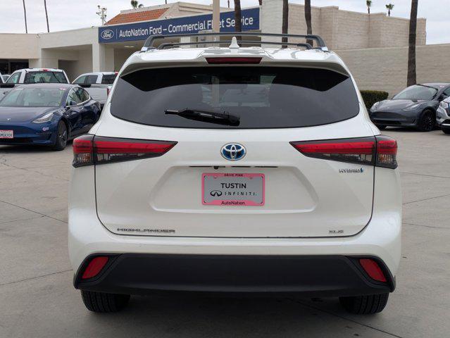 used 2021 Toyota Highlander Hybrid car, priced at $29,495