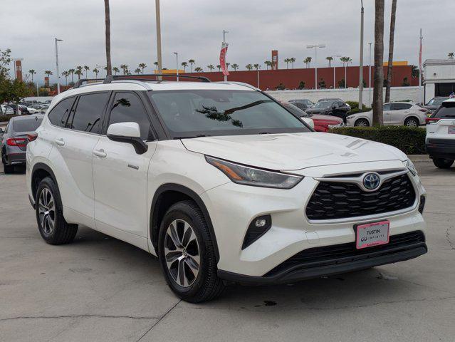 used 2021 Toyota Highlander Hybrid car, priced at $29,495