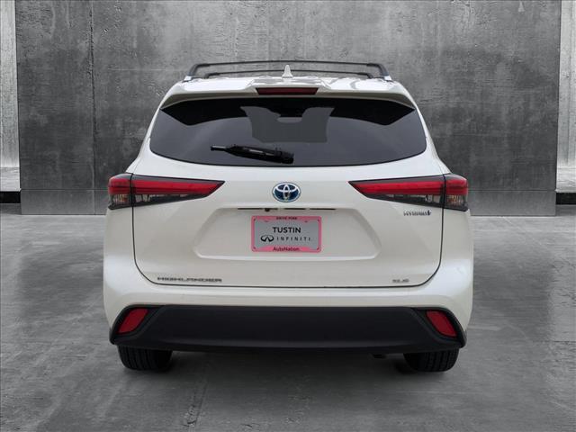 used 2021 Toyota Highlander Hybrid car, priced at $28,992