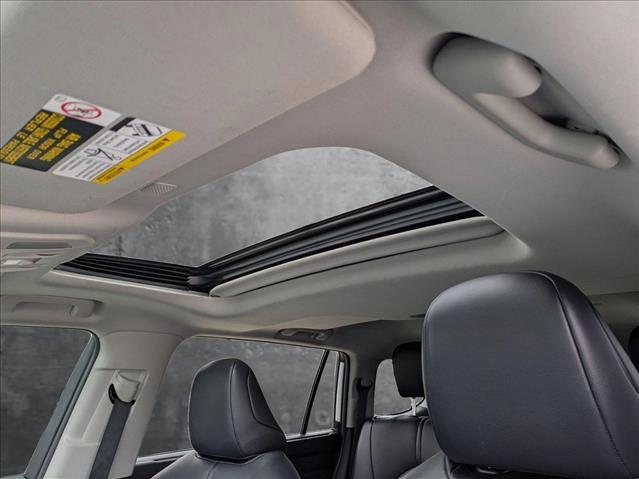 used 2021 Toyota Highlander Hybrid car, priced at $28,992
