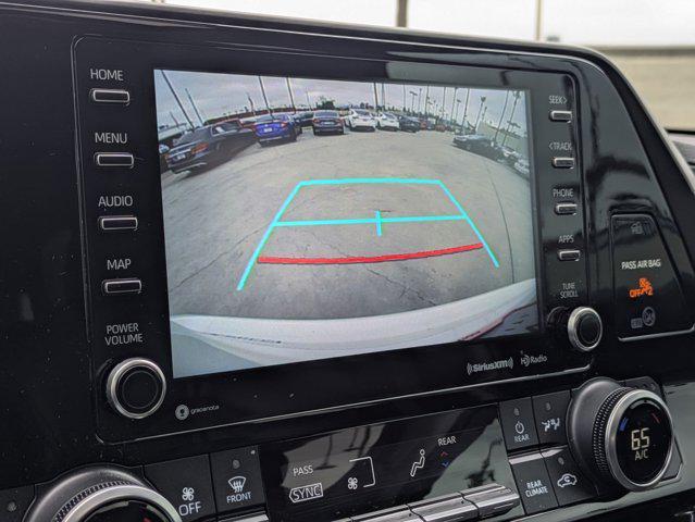 used 2021 Toyota Highlander Hybrid car, priced at $29,495