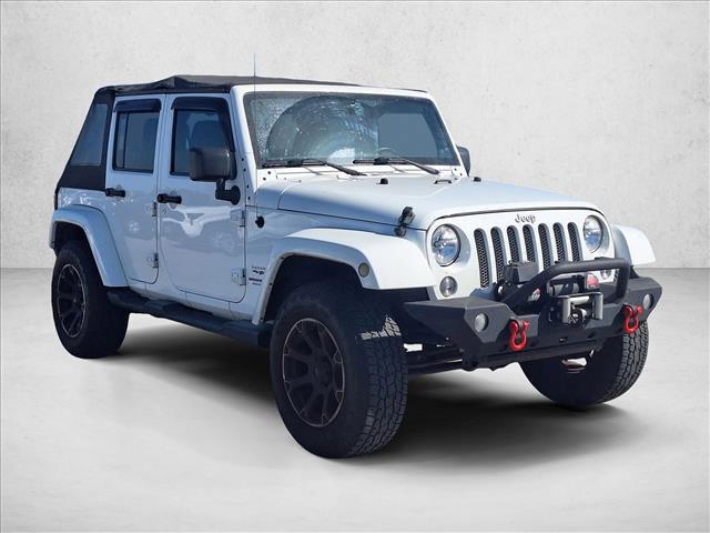 used 2013 Jeep Wrangler Unlimited car, priced at $15,992