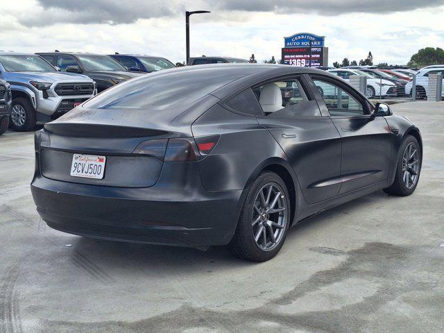 used 2022 Tesla Model 3 car, priced at $22,500