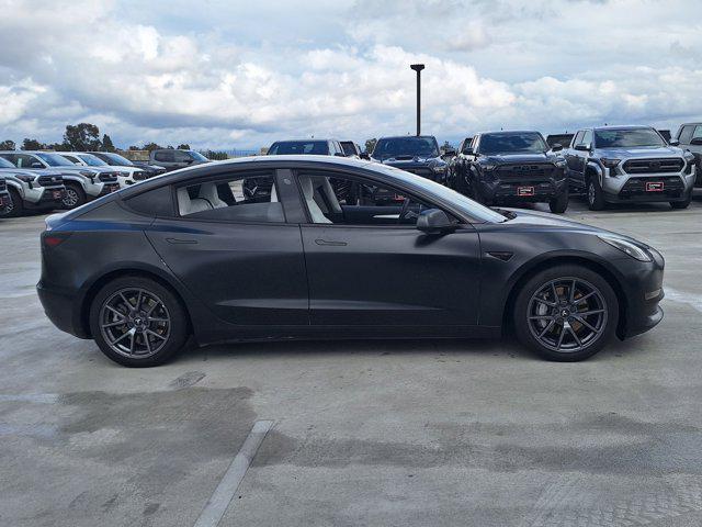 used 2022 Tesla Model 3 car, priced at $22,500