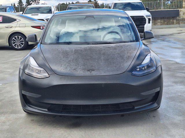used 2022 Tesla Model 3 car, priced at $22,500