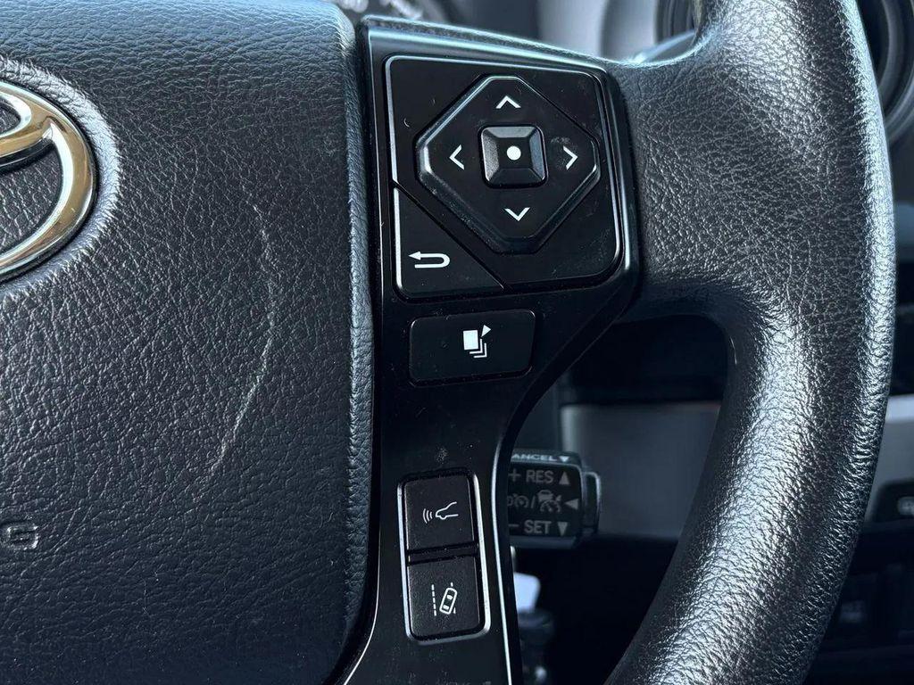 used 2023 Toyota Tacoma car, priced at $25,145