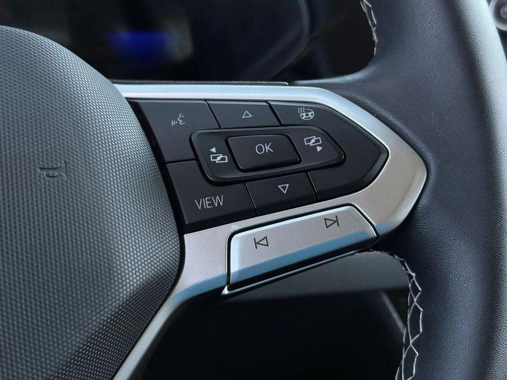 used 2023 Volkswagen Taos car, priced at $19,739