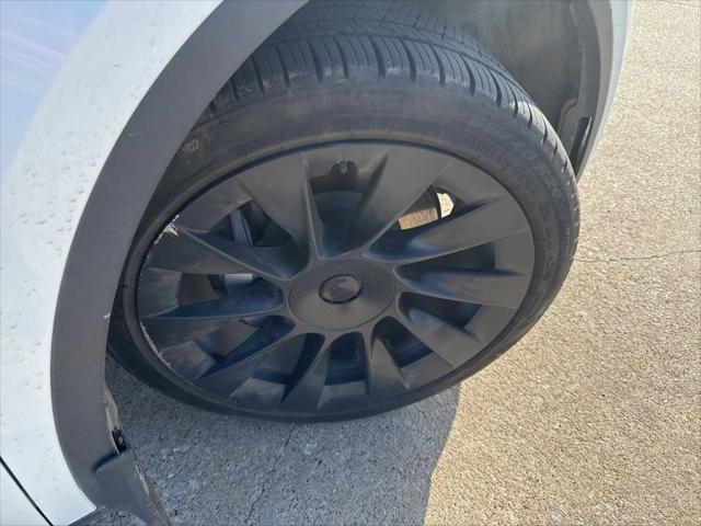 used 2023 Tesla Model Y car, priced at $27,999