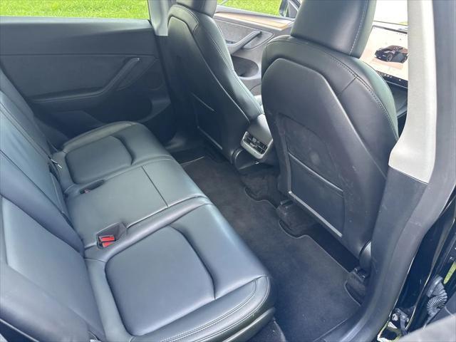 used 2023 Tesla Model Y car, priced at $31,141