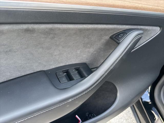 used 2023 Tesla Model Y car, priced at $31,141