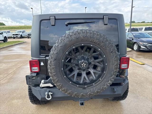 used 2018 Jeep Wrangler JK Unlimited car, priced at $19,808