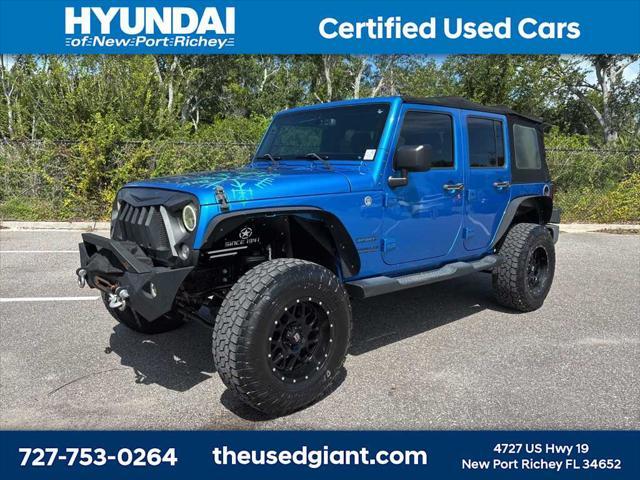 used 2015 Jeep Wrangler Unlimited car, priced at $17,440