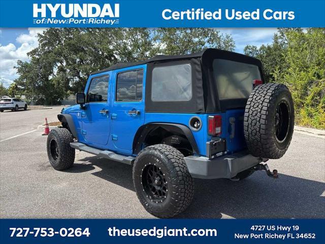 used 2015 Jeep Wrangler Unlimited car, priced at $17,440