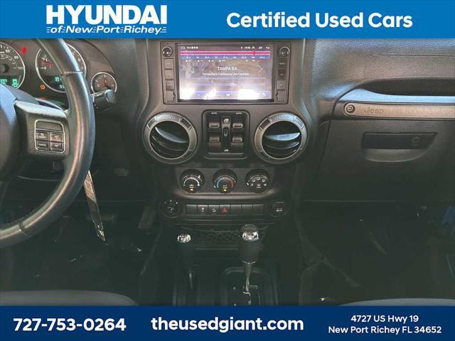 used 2015 Jeep Wrangler Unlimited car, priced at $17,440