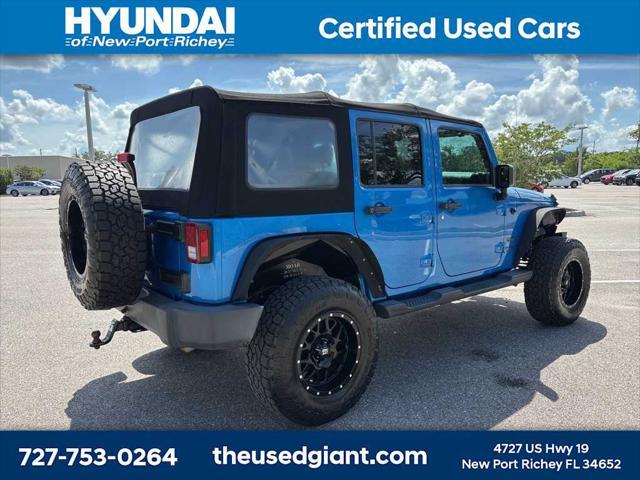 used 2015 Jeep Wrangler Unlimited car, priced at $17,440