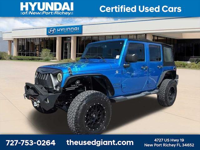used 2015 Jeep Wrangler Unlimited car, priced at $17,440