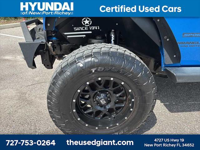used 2015 Jeep Wrangler Unlimited car, priced at $17,440