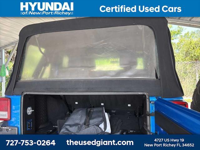 used 2015 Jeep Wrangler Unlimited car, priced at $17,440