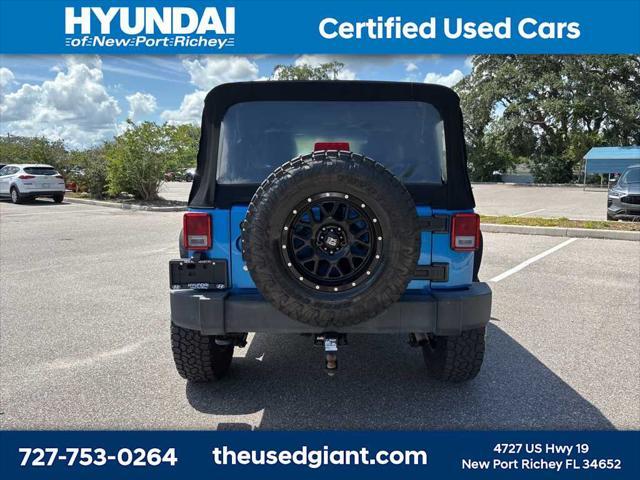 used 2015 Jeep Wrangler Unlimited car, priced at $17,440