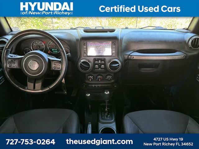 used 2015 Jeep Wrangler Unlimited car, priced at $17,440