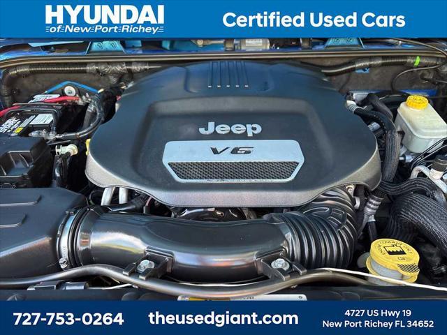used 2015 Jeep Wrangler Unlimited car, priced at $17,440