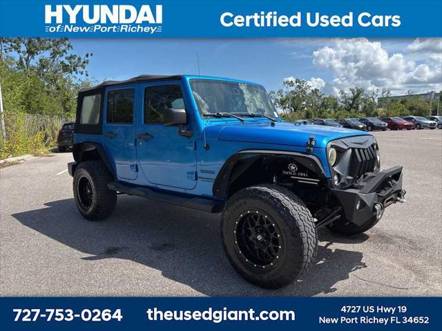 used 2015 Jeep Wrangler Unlimited car, priced at $17,440