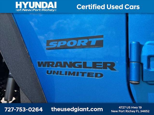 used 2015 Jeep Wrangler Unlimited car, priced at $17,440