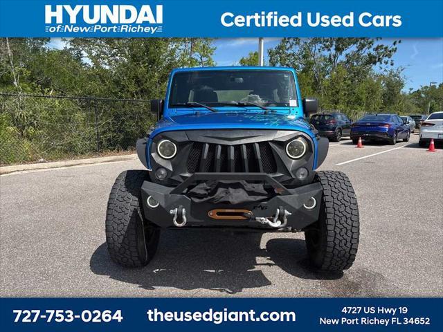 used 2015 Jeep Wrangler Unlimited car, priced at $17,440