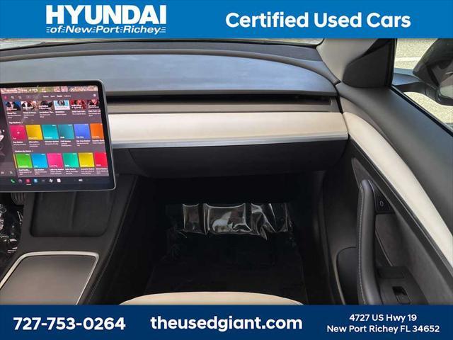 used 2023 Tesla Model 3 car, priced at $25,616