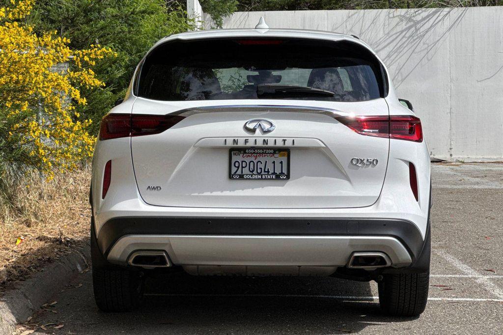 used 2024 INFINITI QX50 car, priced at $30,900