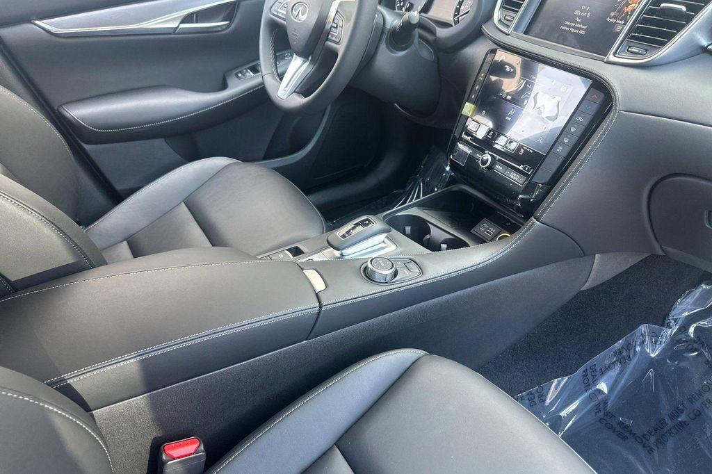 used 2024 INFINITI QX50 car, priced at $30,900