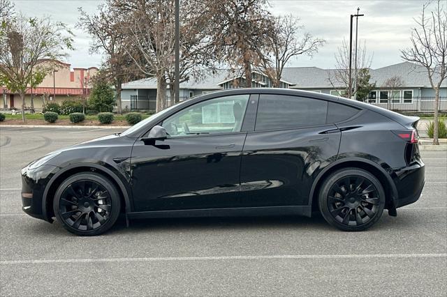 used 2021 Tesla Model Y car, priced at $28,995