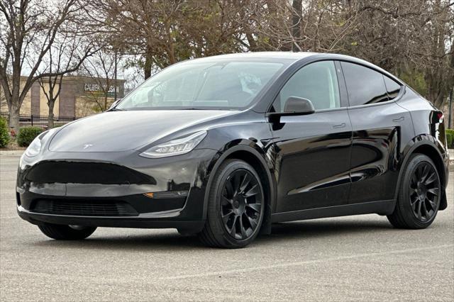 used 2021 Tesla Model Y car, priced at $28,995