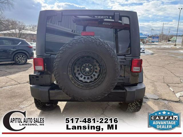 used 2016 Jeep Wrangler Unlimited car, priced at $19,495
