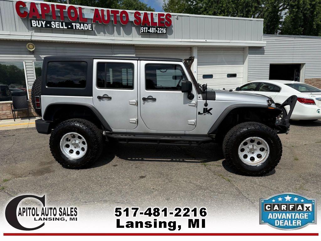 used 2011 Jeep Wrangler Unlimited car, priced at $14,995