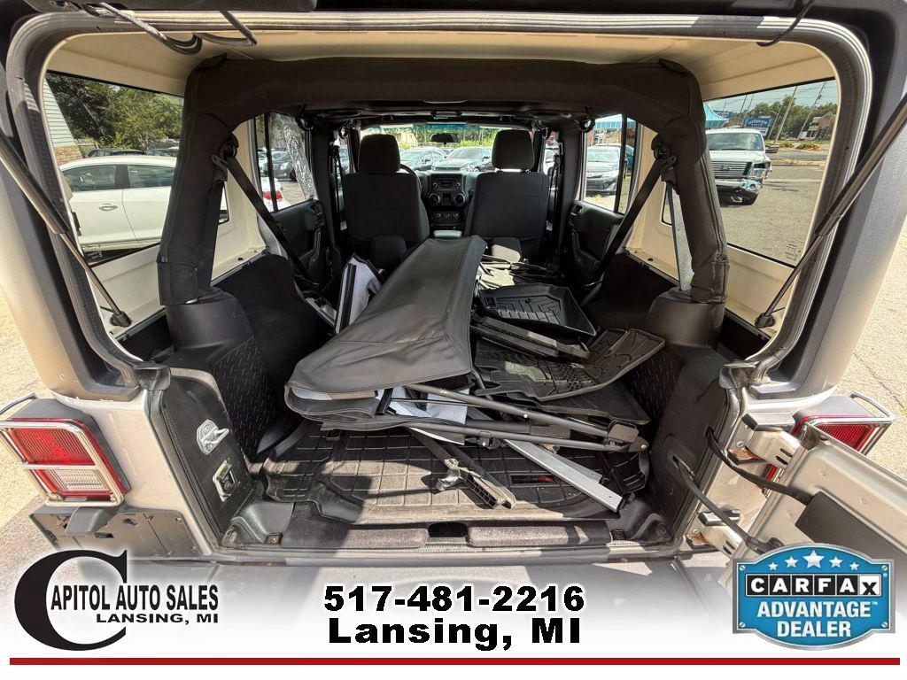 used 2011 Jeep Wrangler Unlimited car, priced at $14,995