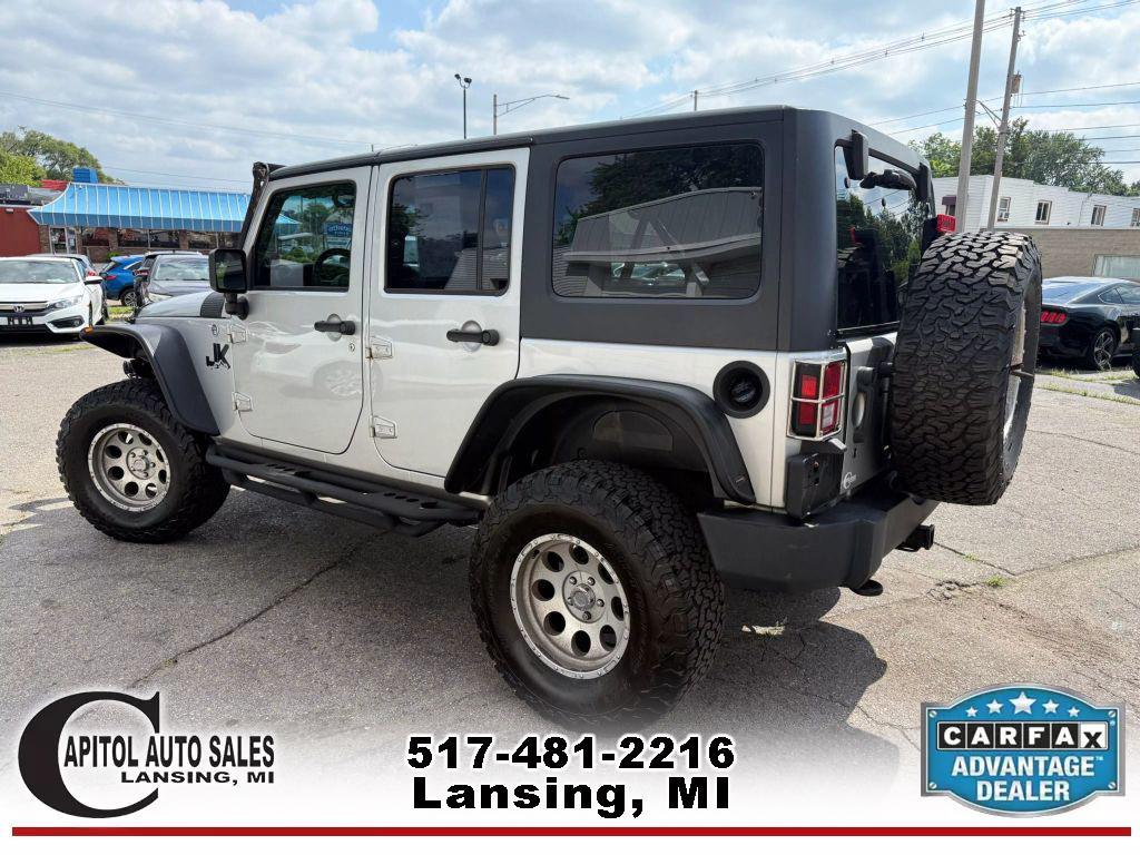 used 2011 Jeep Wrangler Unlimited car, priced at $14,995