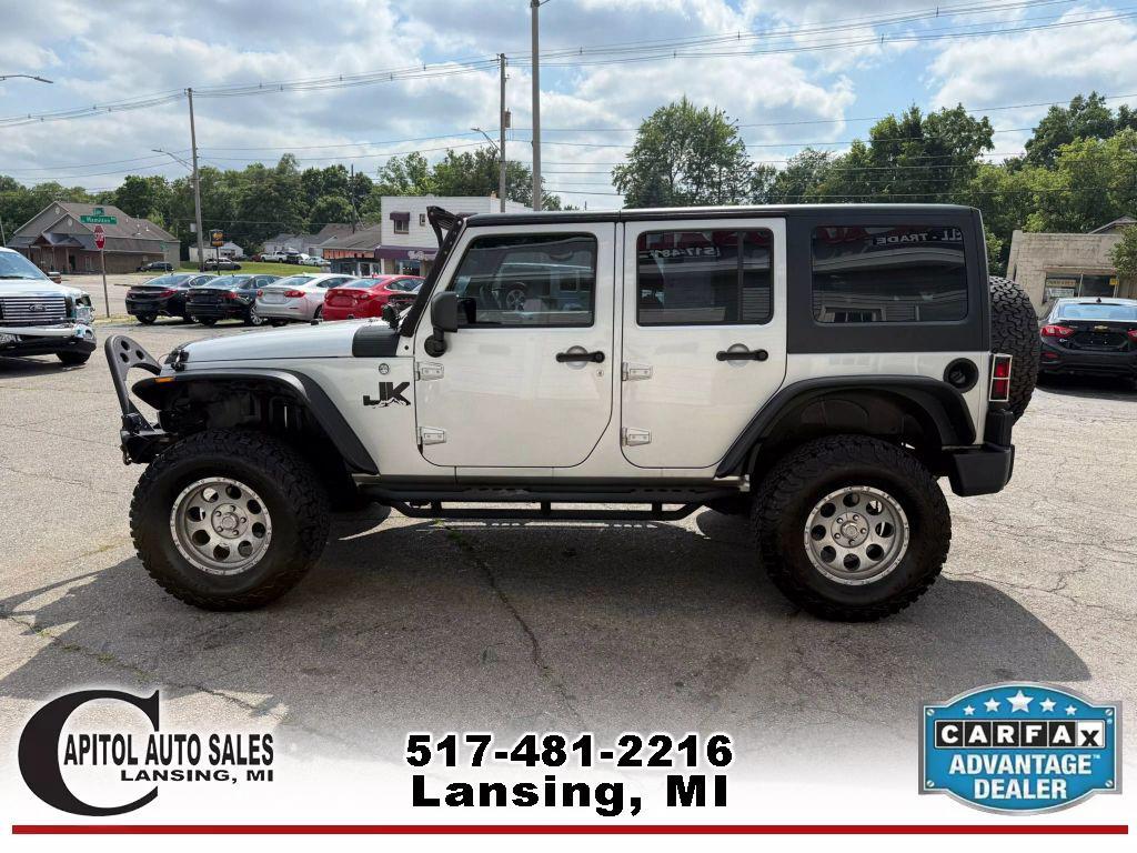 used 2011 Jeep Wrangler Unlimited car, priced at $14,995
