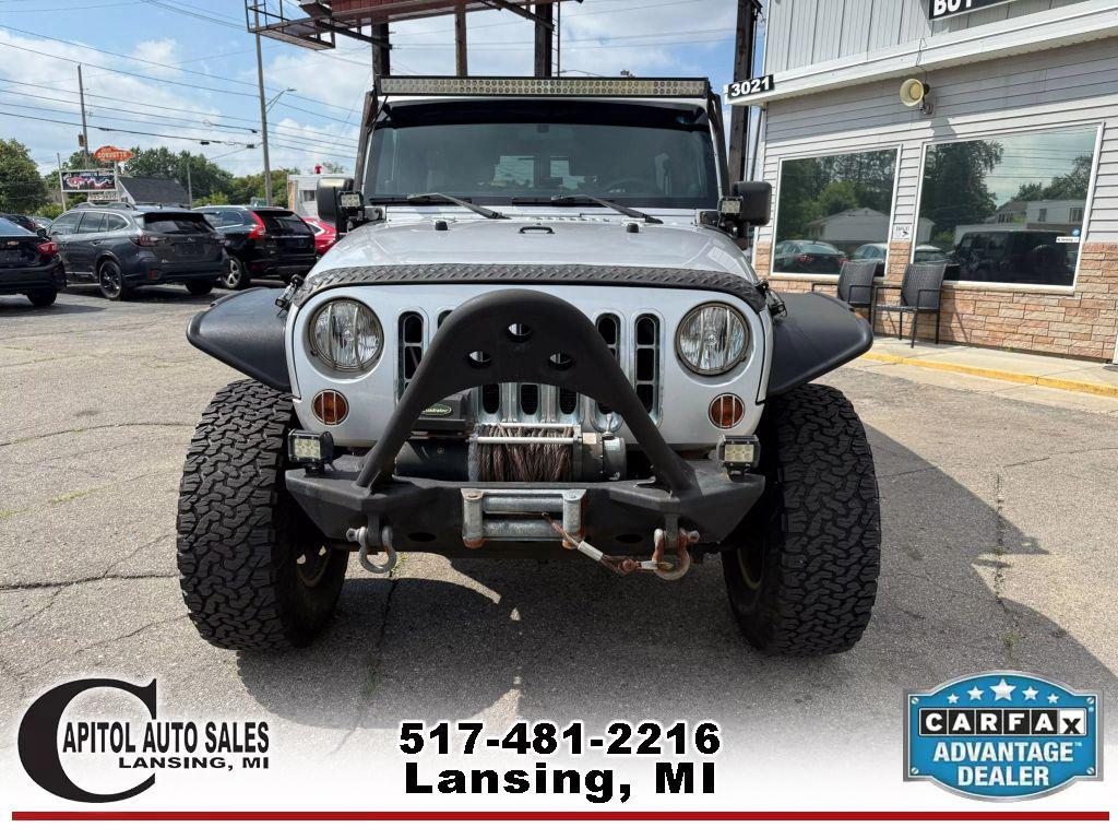 used 2011 Jeep Wrangler Unlimited car, priced at $14,995