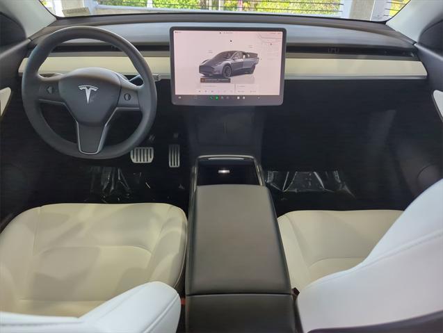 used 2022 Tesla Model Y car, priced at $28,899