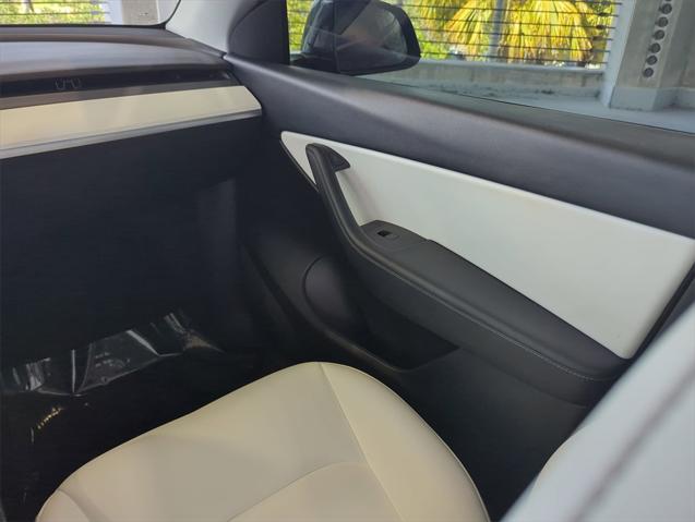 used 2022 Tesla Model Y car, priced at $28,899