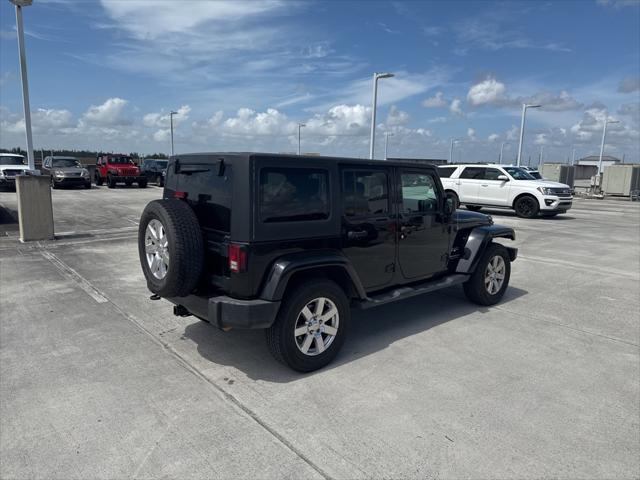 used 2016 Jeep Wrangler Unlimited car, priced at $18,671