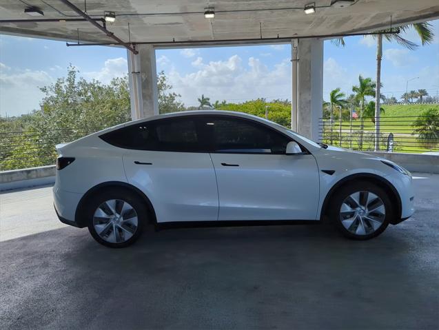 used 2023 Tesla Model Y car, priced at $34,000