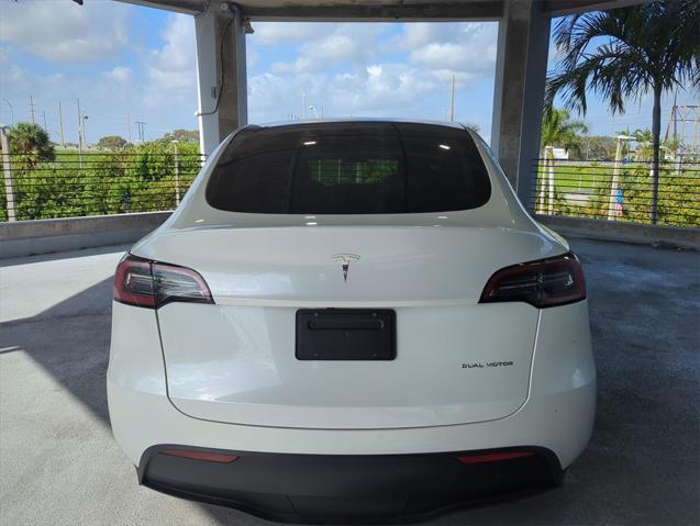 used 2023 Tesla Model Y car, priced at $34,000